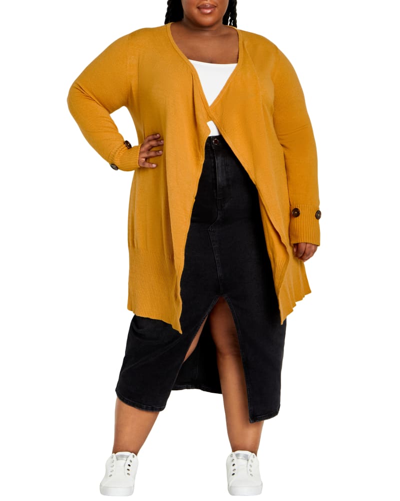 Front of a model wearing a size 22/24 CARDI BIG BUTTON CUFF in Mustard by avenue. | dia_product_style_image_id:320314